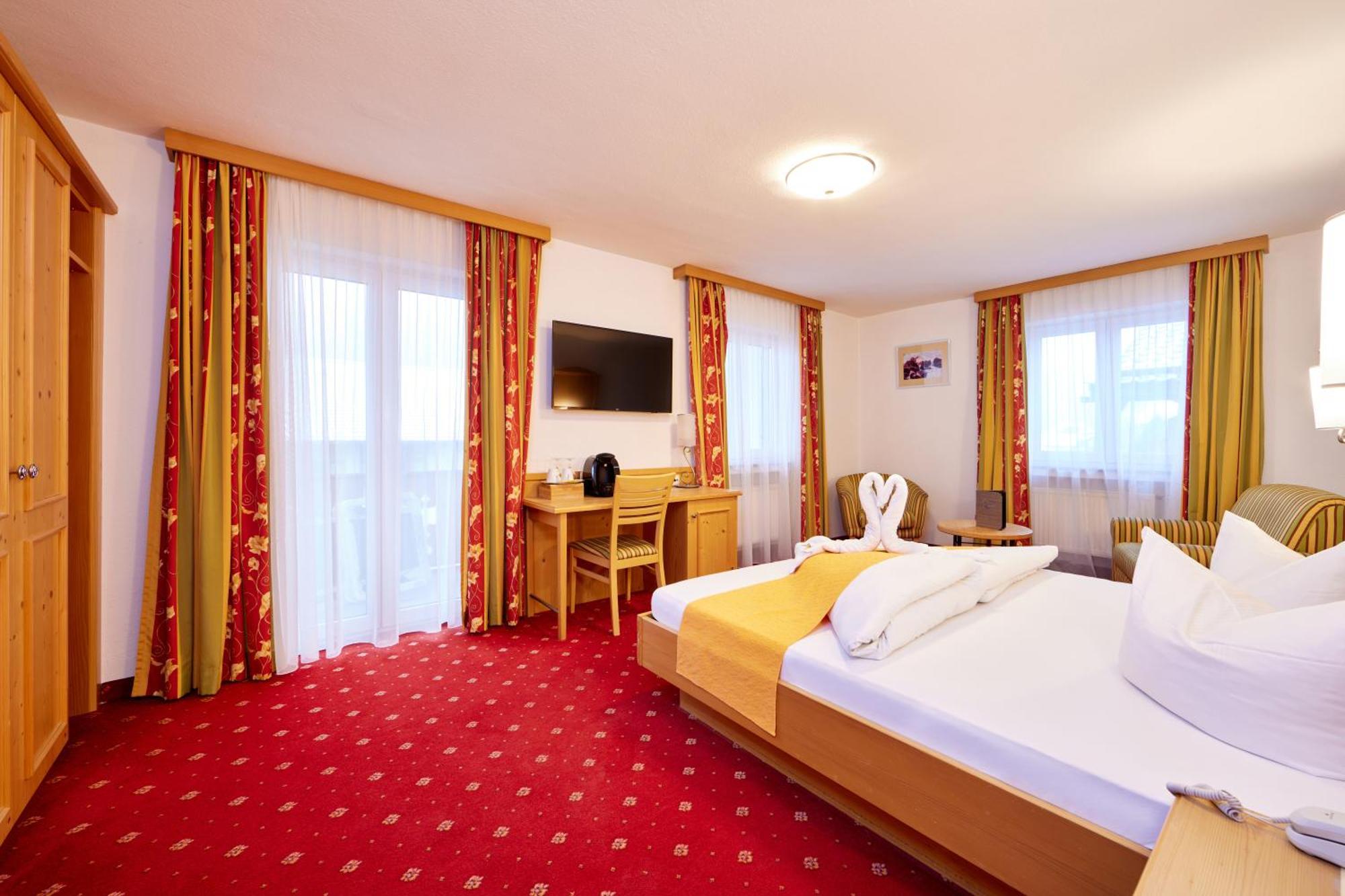 Alpenhotel Rieger Миттенвальд Экстерьер фото